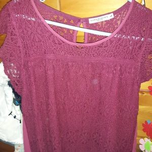 Maroon short sleeved blouse size large but fits like a med.